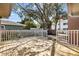A spacious wood deck enclosed with white railing offers an excellent outdoor retreat at 1520 15Th N St, St Petersburg, FL 33704