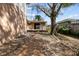 Private backyard featuring mature trees, a wooden deck, and ample shade at 1520 15Th N St, St Petersburg, FL 33704