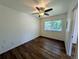 Bedroom with wood floors, ceiling fan and a window providing natural light at 1520 15Th N St, St Petersburg, FL 33704