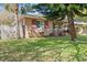 Charming home with mature trees and well-manicured lawn at 1520 15Th N St, St Petersburg, FL 33704