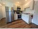 Cozy kitchen featuring stainless steel appliances, modern backsplash, and ample cabinet space at 1520 15Th N St, St Petersburg, FL 33704