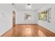 Bright living room with hardwood floors and multiple windows at 1520 15Th N St, St Petersburg, FL 33704