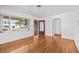 Bright living room showcasing hardwood floors, large window and ample natural light at 1520 15Th N St, St Petersburg, FL 33704