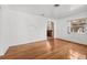 Bright living room with hardwood floors and a view into another room at 1520 15Th N St, St Petersburg, FL 33704