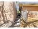 Narrow side yard showcasing stepping stones, gravel, and a raised wood deck at 1520 15Th N St, St Petersburg, FL 33704