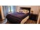 Comfortable bedroom with a large bed, plush pillows, and a cozy atmosphere at 1550 Chateau Wood Dr, Clearwater, FL 33764