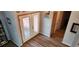 Entryway with wood floors and a modern, bright entryway at 1550 Chateau Wood Dr, Clearwater, FL 33764