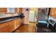 Well-equipped kitchen with stainless steel appliances and stone countertops at 1550 Chateau Wood Dr, Clearwater, FL 33764