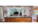 Open floor plan showcasing the kitchen, dining area, and living room at 1550 Chateau Wood Dr, Clearwater, FL 33764