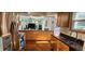 Modern kitchen boasts sleek countertops, stainless steel appliances, and ample cabinet space at 1550 Chateau Wood Dr, Clearwater, FL 33764
