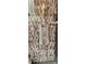 Modern shower featuring stylish vertical tile accent and sleek fixtures at 1550 Chateau Wood Dr, Clearwater, FL 33764
