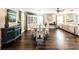 Open floor plan with a dining table and chairs, leading to a cozy living area at 1857 Castle Woods Dr, Clearwater, FL 33759