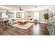 Comfortable living room with stylish furniture, ample natural light, and hardwood floors at 1857 Castle Woods Dr, Clearwater, FL 33759