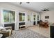 Bright dining area featuring large windows, and a view to the backyard at 2011 Rebecca Dr, Clearwater, FL 33764