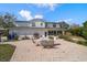 Spacious backyard with a brick patio perfect for outdoor dining and entertaining at 2102 S Fore Cir, Tampa, FL 33612