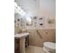 Charming half-bath featuring tile accents, and a pedestal sink at 2102 S Fore Cir, Tampa, FL 33612