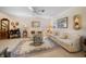 Bright living room with neutral colors, comfortable seating, and natural light at 2102 S Fore Cir, Tampa, FL 33612