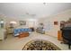 Spacious main bedroom with neutral walls, plantation shutters, and a ceiling fan at 2102 S Fore Cir, Tampa, FL 33612