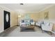 Comfortable living room with modern furniture, neutral tones, and decorative accents at 2320 E Harbor S Dr, St Petersburg, FL 33705
