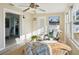 Comfortable sun room with natural light, access to kitchen, and cozy furnishings at 2320 E Harbor S Dr, St Petersburg, FL 33705