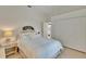 Bright bedroom with white walls, a queen bed, and closet at 2823 Clubhouse Dr, Plant City, FL 33566