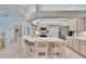 Open kitchen with counter seating and views of the pantry at 2823 Clubhouse Dr, Plant City, FL 33566