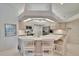 Spacious kitchen with island seating and light wood cabinetry at 2823 Clubhouse Dr, Plant City, FL 33566