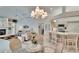 Open living space with the kitchen and fireplace in view at 2823 Clubhouse Dr, Plant City, FL 33566