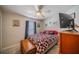 Comfortable bedroom features natural light from the window and attractive decor and furnishings at 3017 Minuteman Ln, Brandon, FL 33511