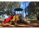 Community playground with colorful slides and climbing structures at 3017 Minuteman Ln, Brandon, FL 33511