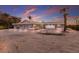 Charming single-story home with a three-car garage and well-manicured landscape for serene beachside living at 3341 Gulf Of Mexico Dr, Longboat Key, FL 34228