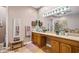 Bright bathroom with double vanity, large mirror, and stylish decor at 4301 W San Luis St, Tampa, FL 33629