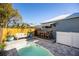 Backyard pool with an outdoor seating area at 4301 W San Luis St, Tampa, FL 33629