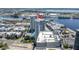 A high-rise condo's pool and lush landscaping are featured in an aerial view showcasing amenities and neighborhood access at 449 S 12Th St # 2702, Tampa, FL 33602
