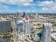 A condo is pictured in an aerial view, showcasing the skyline and desirable neighborhood features, location and amenities at 449 S 12Th St # 2702, Tampa, FL 33602