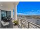 Beautiful condo balcony showcasing outdoor dining and a seating area with amazing city and water views at 449 S 12Th St # 2702, Tampa, FL 33602