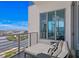 Balcony with comfortable seating offering stunning water views and city skyline at 449 S 12Th St # 2702, Tampa, FL 33602