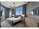 Modern bedroom with city views, custom drapery, and chic gray and white accents at 449 S 12Th St # 2702, Tampa, FL 33602