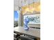 Elegant dining room features city views, modern lighting, and a stylish table centerpiece at 449 S 12Th St # 2702, Tampa, FL 33602