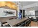 Open dining area with a modern table, stylish decor, and a view into the kitchen at 449 S 12Th St # 2702, Tampa, FL 33602