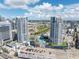 Exterior shot of the building showing a vibrant skyline, resort-style pool, and convenient parking at 449 S 12Th St # 2702, Tampa, FL 33602