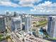 Exterior daytime aerial view with a vibrant skyline, resort-style pool, and convenient parking at 449 S 12Th St # 2702, Tampa, FL 33602