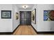 Hallway with contemporary decor and hardwood floors at 449 S 12Th St # 2702, Tampa, FL 33602