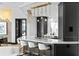 Open kitchen design with marble countertops, black cabinets and modern lighting at 449 S 12Th St # 2702, Tampa, FL 33602