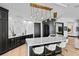 Open concept kitchen with marble backsplash, custom cabinets and wine fridge at 449 S 12Th St # 2702, Tampa, FL 33602