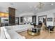 Spacious open concept living room connected to a modern kitchen with white countertops at 449 S 12Th St # 2702, Tampa, FL 33602