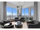 Bright living room features floor-to-ceiling windows and stylish modern furniture at 449 S 12Th St # 2702, Tampa, FL 33602