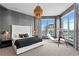 Spacious main bedroom featuring city views, modern furniture, and elegant decor at 449 S 12Th St # 2702, Tampa, FL 33602