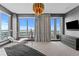 Bright main bedroom offers city views, stylish furniture, and modern decor at 449 S 12Th St # 2702, Tampa, FL 33602