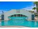Unique bridge over the pool leading to waterfall features for a resort-like experience and visual appeal at 449 S 12Th St # 2702, Tampa, FL 33602